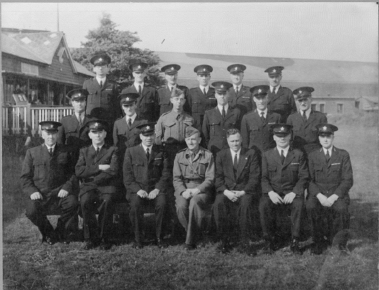a black and white photo of people in uniform