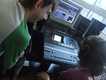 Recording in the studio at the main desk