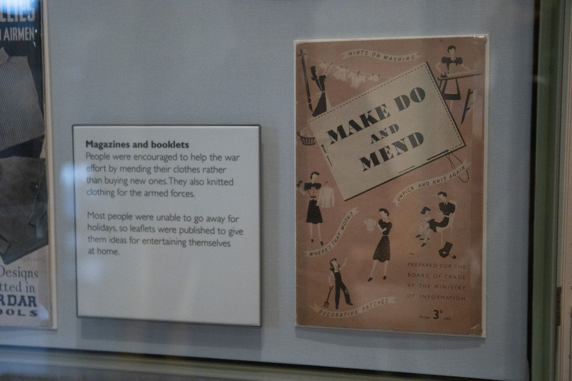 A photo of a Make Do and Mend leaflet on display next to an info panel on display in the Herbert's history gallery