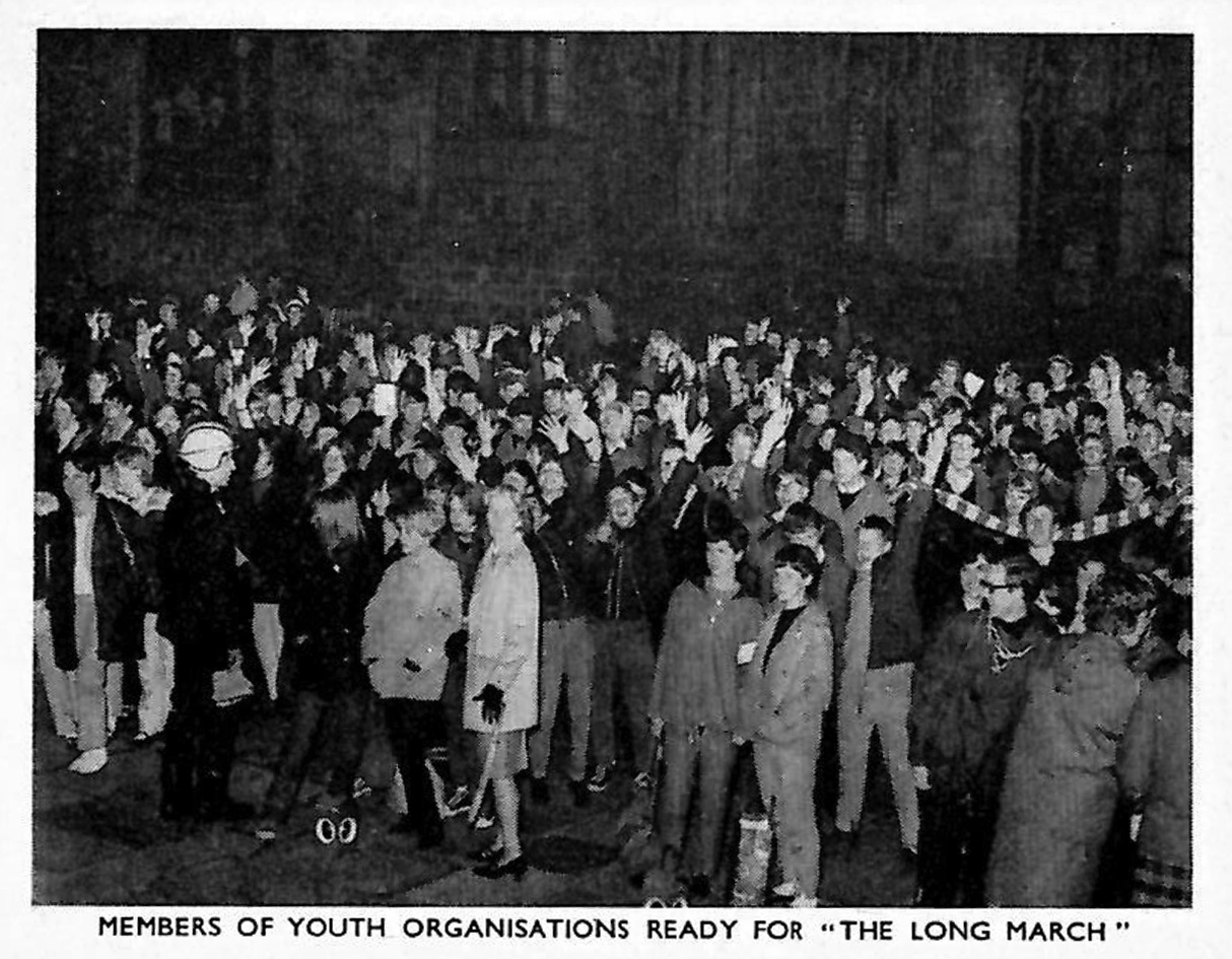 A black and white photo showing a crowd of young people with the headline, 'Members of youth organisations ready for "The Long March"'