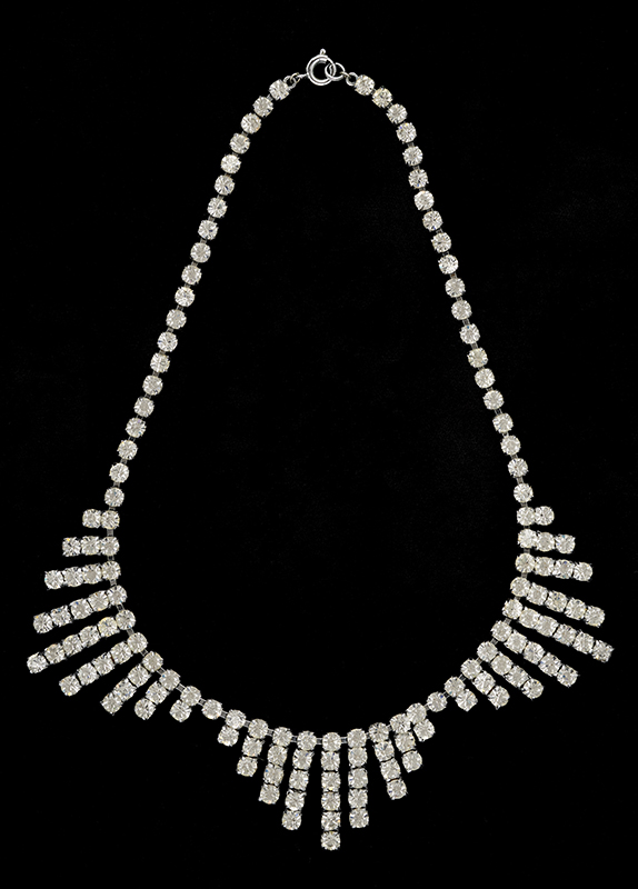 A 1930s diamante necklace with a tiered, art deco style design