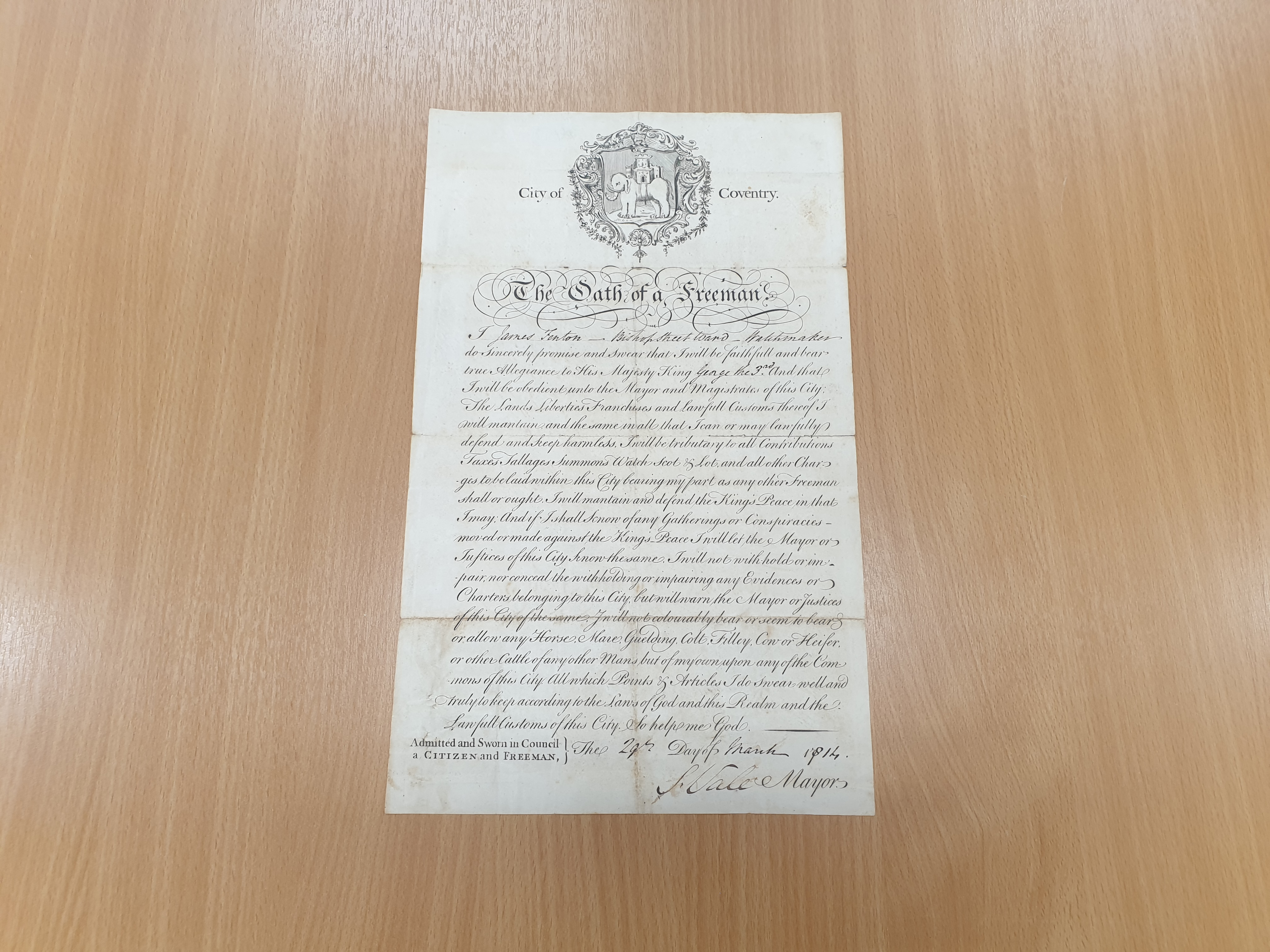 A handwritten Freeman's Oath in italic script with the City of Coventry Elephant and Castle coat of arms printed at the top.