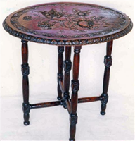 Folding table carved by Mary Ann’s friend, Elma Stuart, 1872 to 1880.