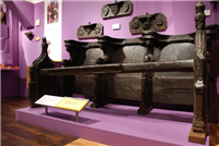 This medieval choir stall originally came from Whitefriars Friary. It was later used as a school bench in the grammar school founded by John Hales.